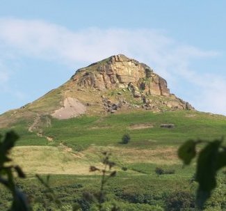 As you drive along the Great Ayton - Guisborough road, the skyline is dominated by striking outline of the rocky 1051 ft (320 m) high 'mountain' of Roseberry Topping.