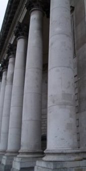 The patched up columns are the result of damage incurred in the 1922 civil war.
