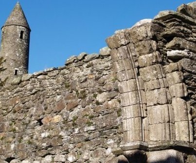 A few fragments remain of the wonderful stonework that once formed part of the church structures at Glendalough.