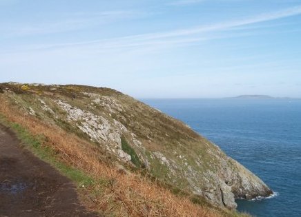 The cliffs near Howth and Lambay Island in the right-distance.
