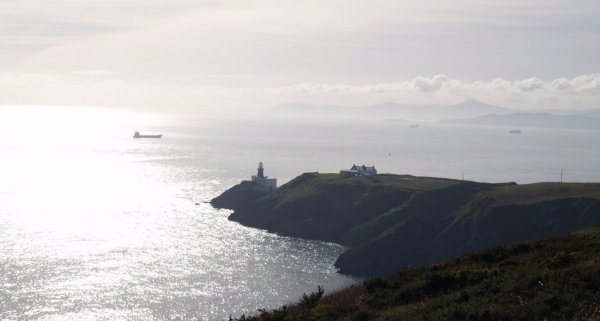 The Bailey Lighthouse and looking across Dublin Bay to the Wicklow hills and mountains.
