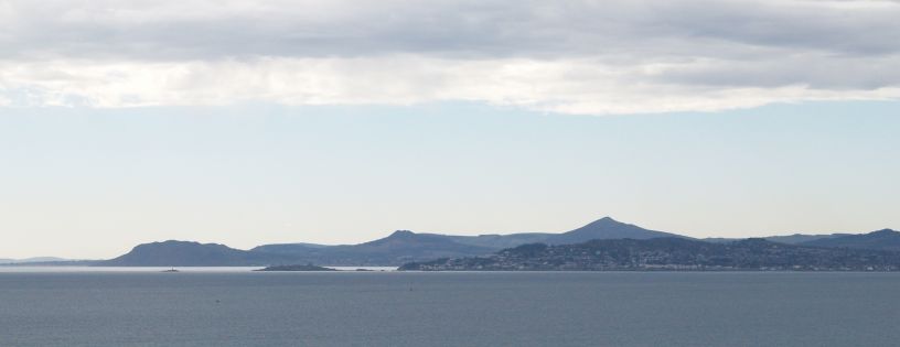 The Wicklow mountains viewed across Dublin Bay from the Howth Cliff Walk Howth to Sutton Cliff Walk, Co. Dubin, Ireland