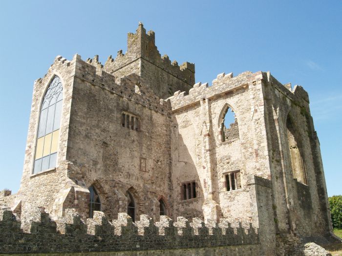 Tintern Abbey: The Lady Chapel and east end of the Chancel. The fine battlemented walls around the abbey were built by Sir Vesey Colclough in the 18th century Tintern Abbey, Wexford, Ireland