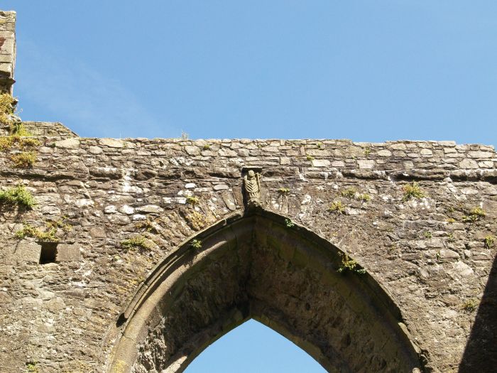 The carved figure at the top of the chancel's east window Tintern Abbey, Wexford, Ireland