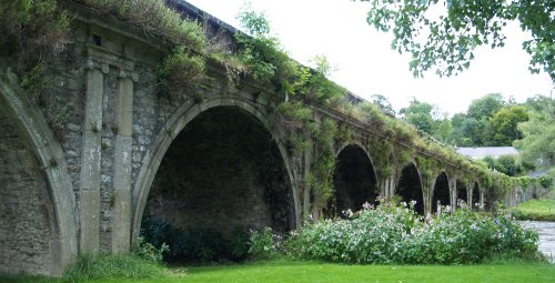 The fine stonework of the multi-arched bridge over the River Nore at Inistioge village - Inistioge, County Kilkenny, Ireland