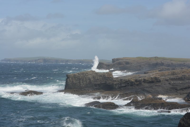 Last look at the wild Atlantic coast at the Bridges of Ross as the waves crash high against the cliffs Bridges of Ross walk, Loop Head Peninsula, Co Clare, West of Ireland