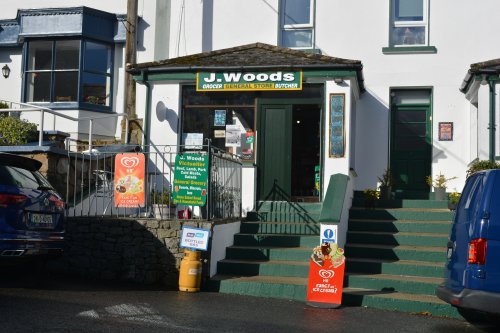 The J. Woods general store on Main Street, Roundstone village. Roundstone, Connemara, Co. Galway, Ireland