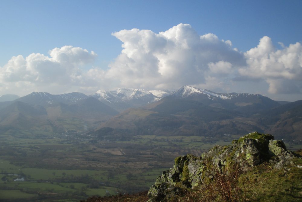 view from rocks on the Doups Climbing Skiddaw from Millbeck, Cumbria, Lake District National Park, England