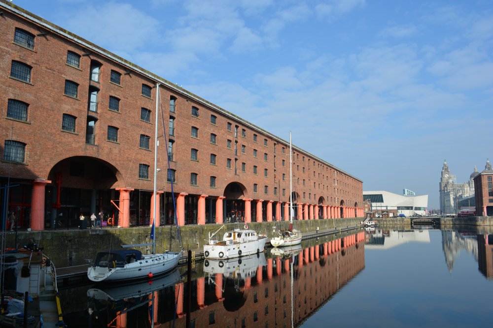 The might pillars of the colonnades of the quayside of Albert Dock Liverpool's historic docks England