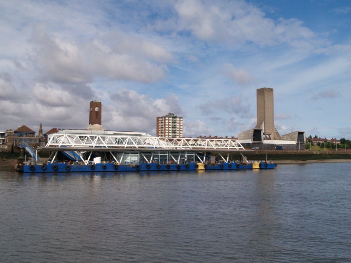 River Mersey Ferry Trip Scenes: Seacombe landing stage, the tall building on the right is one of the air ventilation stations for the second Mersey road Tunnel