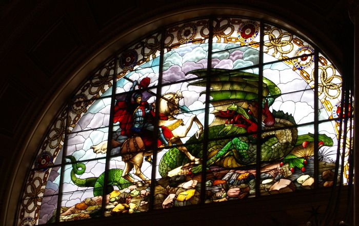 stained glass windows of St George and the Dragon at either end of the Concert Hall of St George's Hall Liverpool