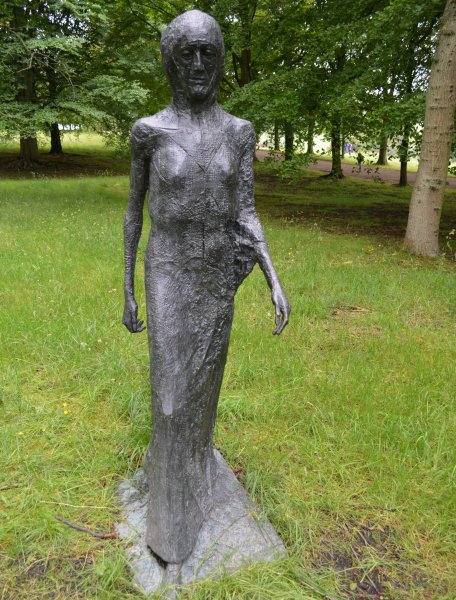 sculpture the WALKING MADONNA by the artist sculptor from 1981 by Dame Elisabeth Frinks Chatsworth House Derbyshire Dales