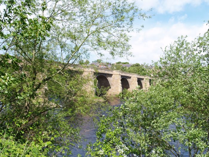 The handsome modern road bridge over the River Tyne at Corbridge.