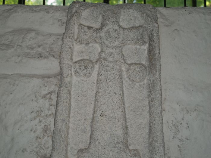 An early Saxon cross behind the alter.