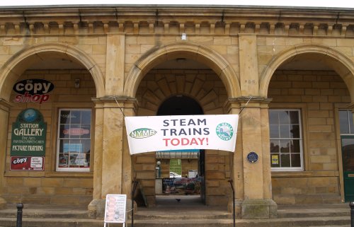 The banner advertises the running of steam trains on Network Rail between Grosmont and Whitby by the North Yorkshire Moors Railway, so a quick trip from Grosmont to Whitby!