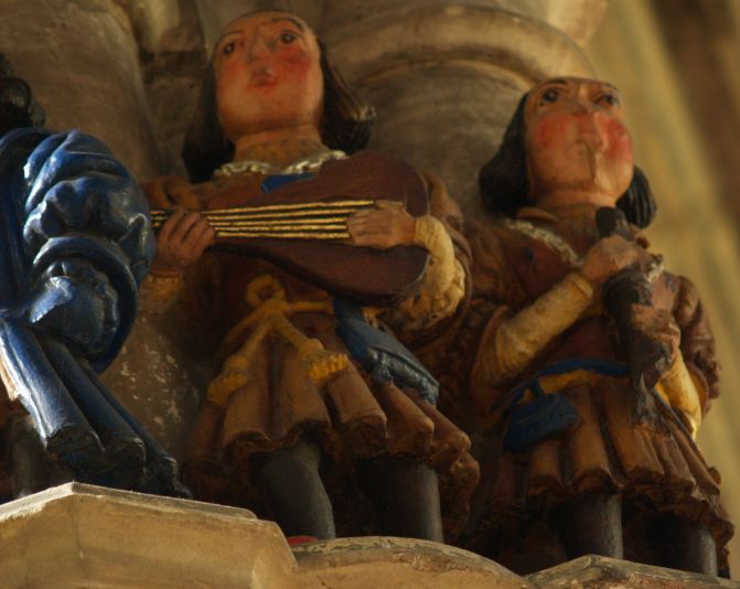 Beverley St Mary's Church:  The wonderful coloured sculptures of musicians on a capital of one of the pillars of the nave.