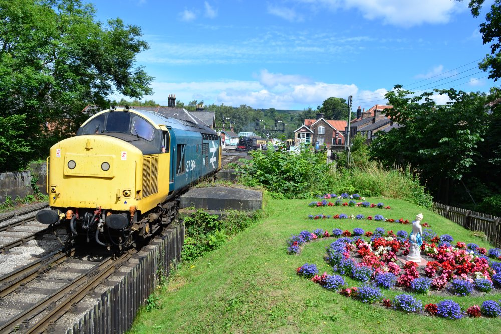 NYMR's Class 37 diesel loco 37264 running light from Grosmont station, entered service in 1965 as D6964, withdrawn 2001 and preserved