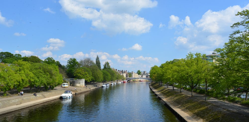 River bank views of the River Ouse looking towards Lendal Bridge, York