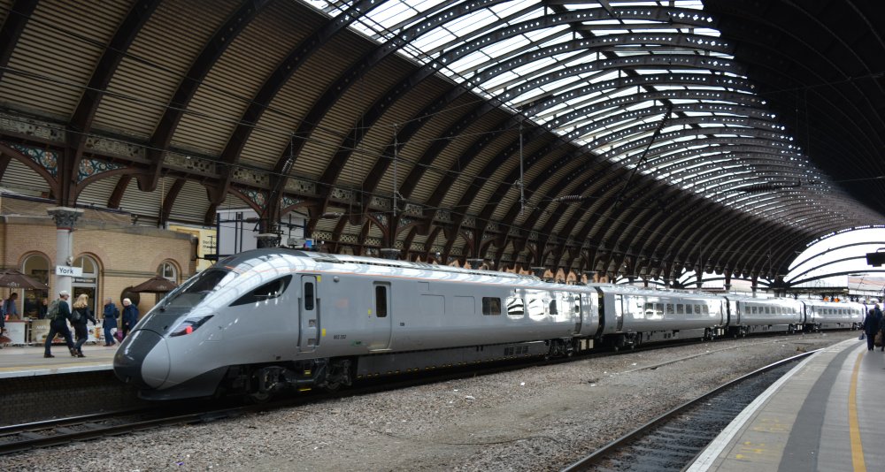 Bi-mode Class 802 (sub-class 802/2) 802202 in plain grey livery on a test run at York Station