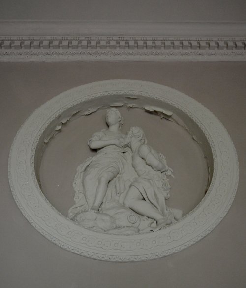 sculpture interior of Temple of Piety Studley Royal walks park gardens in Autumn