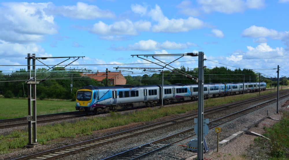 Unidentified Class 185s with the 0907 TransPennine service from Redcar Central to Manchester Airport trainspotting Colton Junction footbridge