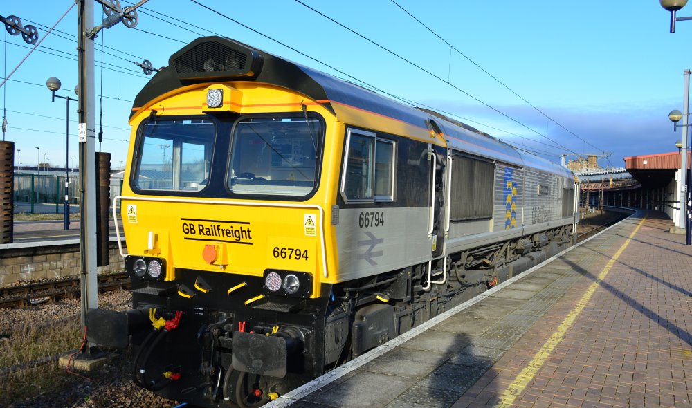 GB Railfreight EMD diesel locomotive Class 66/7 66794 Steve Hannam, heritage livery British Railfreight triple grey livery blue and yellow British Rail Railfreight decal