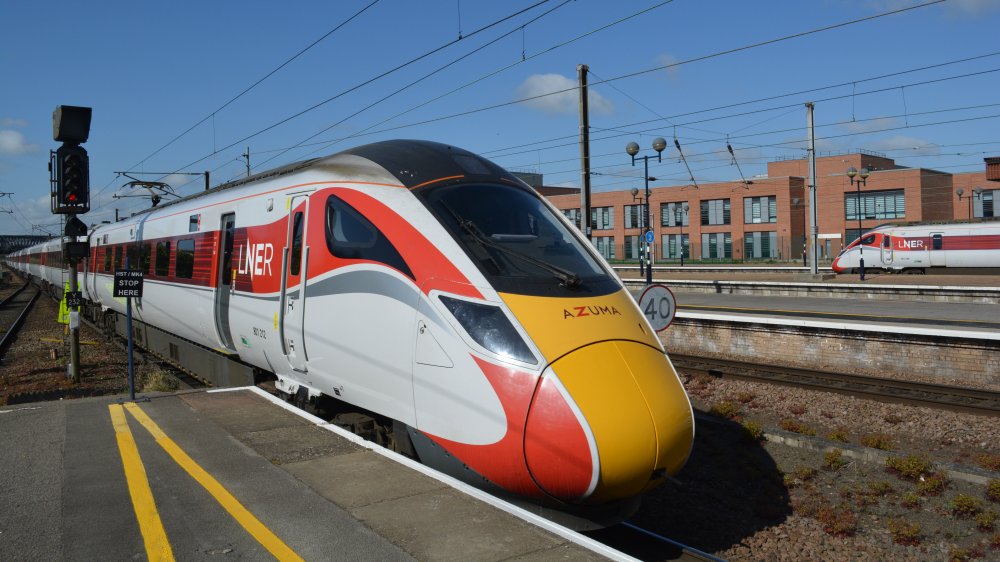 Class 801 EMU 801212 departing York Station with an LNER AZUMA service from Newcastle to London Kings Cross (23/04/2022)