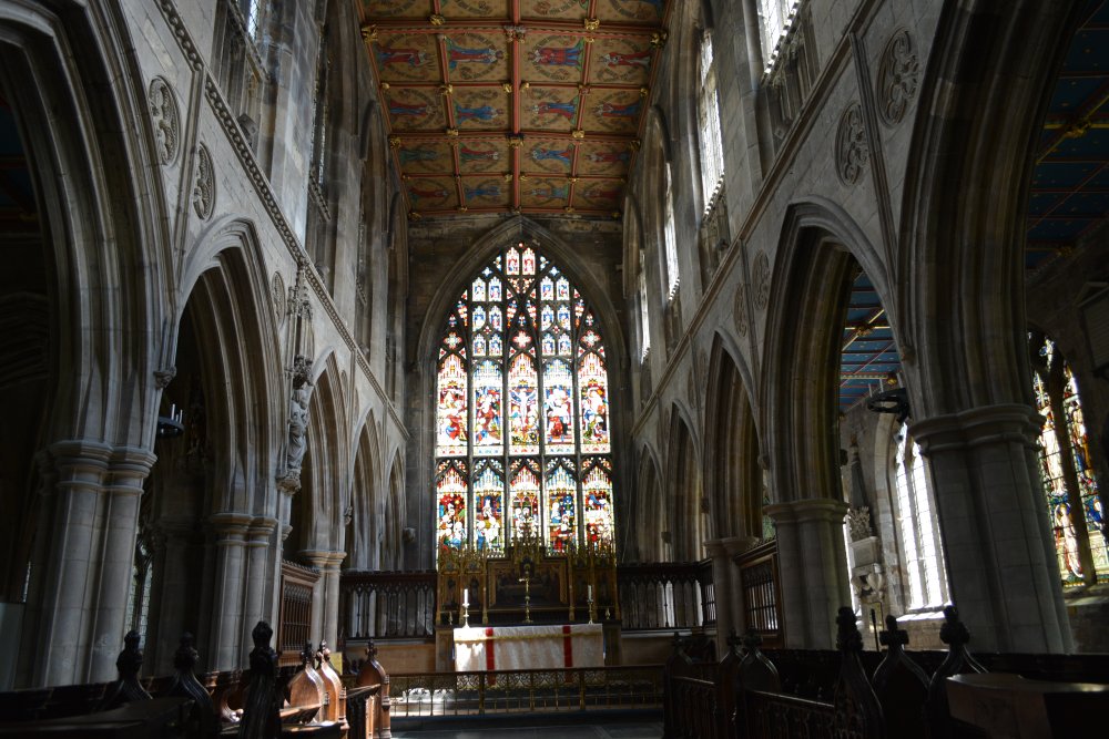 The decorated ceiling of the chancel, altar and east window of St Mary's Church, Beverley.