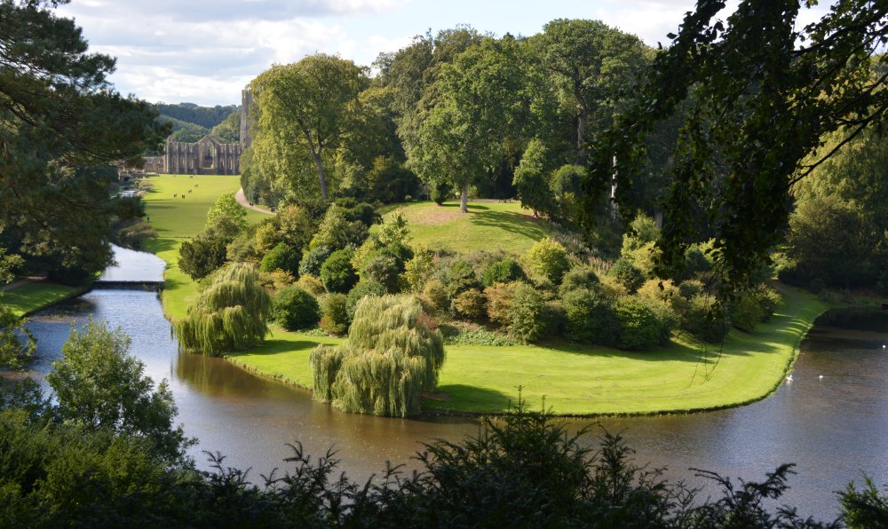 Surprise view of the lakes and abbey Studley Royal parks and gardens