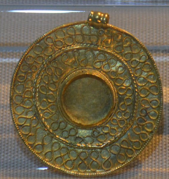 The gold wire bead found in the grave of the Anglo Saxon Princess, Street House, Loftus Kirkleatham Old Hall Museum and Art Gallery, Cleveland